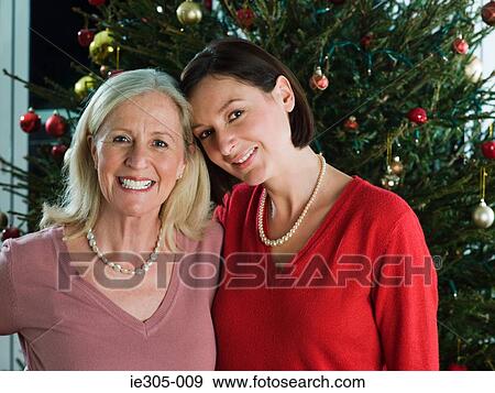 Mother and daughter at chris View Large Photo Image Stock Photo - Mother and daughter at chris. Fotosearch