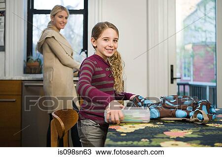 Mother and daughter at home View Large Photo Image Stock Image - Mother and daughter at home. Fotosearch