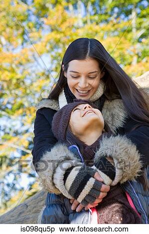 Mother and daughter in park View Large Photo Image Stock Photography - Mother and daughter in park. Fotosearch