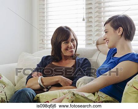 Stock Photograph - Mother and daughter talking. Fotosearch