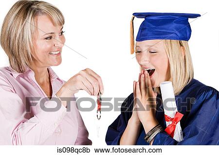Stock Image - Mother and graduating daughter. Fotosearch