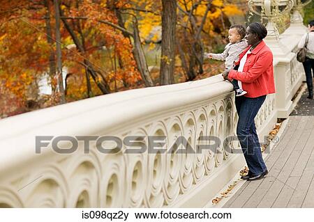 Stock Photo - Mother and son in park. Fotosearch