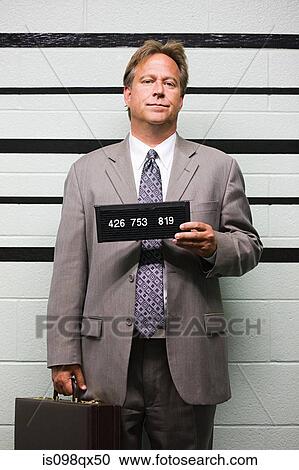 Stock Image - Mugshot of businessman. Fotosearch