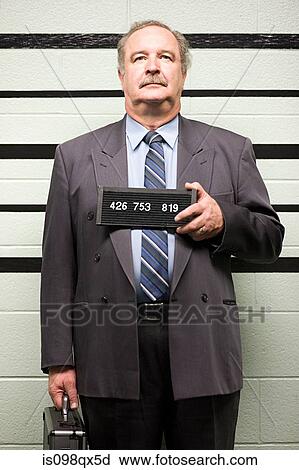 Stock Image - Mugshot of businessman. Fotosearch