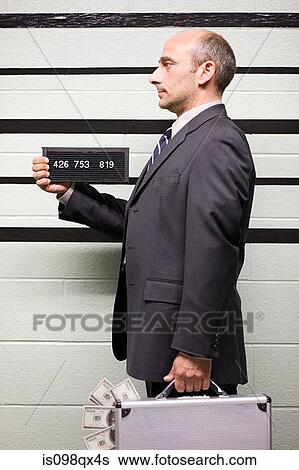 Mugshot of businessman View Large Photo Image Stock Photograph - Mugshot of businessman. Fotosearch