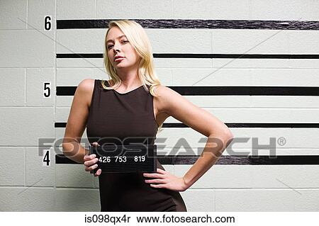 Mugshot of female criminal View Large Photo Image Stock Photography - Mugshot of female criminal. Fotosearch