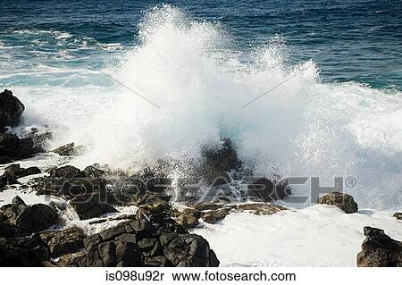 Stock Photography - Ocean waves and rocks, La Caleta, Lanzarote. Fotosearch