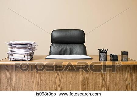 Office desk with overflowing inbox View Large Photo Image Picture - Office desk with overflowing inbox. Fotosearch