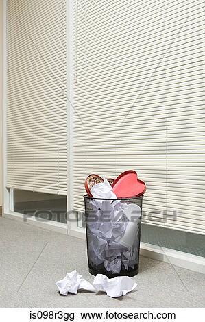 Office wastepaper basket full of paper and discarded valentines chocolate box View Large Photo Image Stock Image - Office wastepaper basket full of paper and discarded valentines chocolate box. Fotosearch