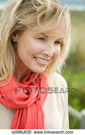 Outdoors portrait of a woman View Large Photo Image Stock Image - Outdoors portrait of a woman. Fotosearch