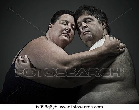 Stock Image - Overweight couple. Fotosearch