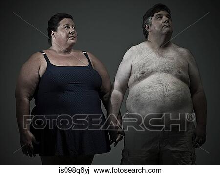 Stock Image - Overweight couple. Fotosearch