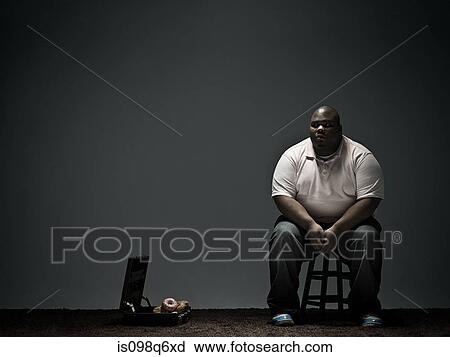 Overweight man and doughnuts in briefcase View Large Photo Image Stock Image - Overweight man and doughnuts in briefcase. Fotosearch