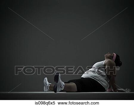 Overweight woman in sports clothing View Large Photo Image Stock Photography - Overweight woman in sports clothing. Fotosearch