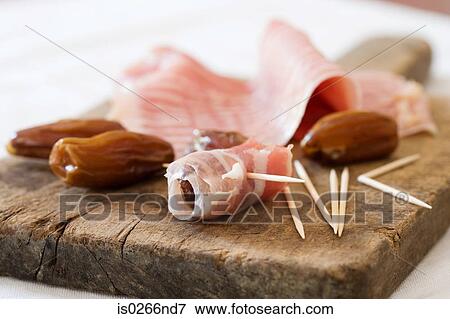 Parma ham and dates View Large Photo Image Stock Photo - Parma ham and dates. Fotosearch
