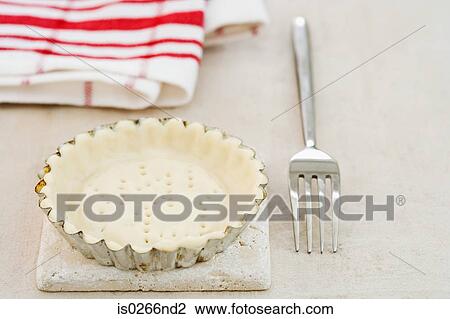 Pastry in a flan tin View Large Photo Image Stock Image - Pastry in a flan tin. Fotosearch