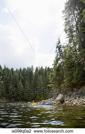 Stock Image - People kayaking. Fotosearch