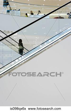 People on escalator View Large Photo Image Stock Photo - People on escalator. Fotosearch