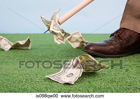 Picking up banknotes with litter stick View Large Photo Image Stock Image - Picking up banknotes with litter stick. Fotosearch