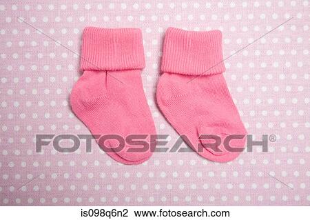 Stock Image - Pink baby socks. Fotosearch
