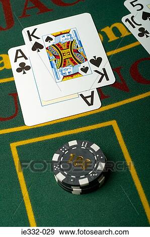 Playing cards on a blackjack table View Large Photo Image Stock Photo - Playing cards on a blackjack table. Fotosearch