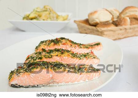 Poached salmon topped with dill View Large Photo Image Stock Image - Poached salmon topped with dill. Fotosearch