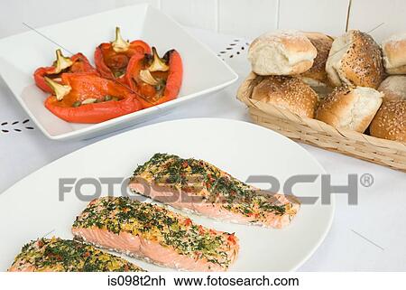 Poached salmon with roasted peppers and bread rolls View Large Photo Image Stock Image - Poached salmon with roasted peppers and bread rolls. Fotosearch