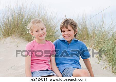Stock Image - Portrait of a boy and girl. Fotosearch