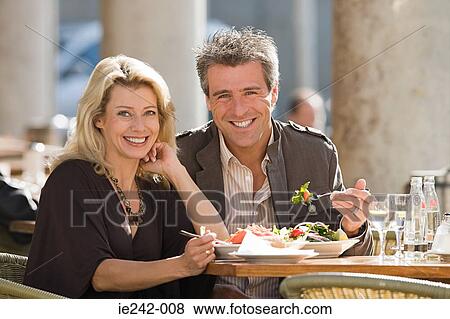Portrait of a couple dining View Large Photo Image Stock Photo - Portrait of a couple dining. Fotosearch