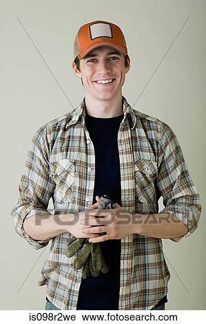 Stock Image - Portrait of a farm worker. Fotosearch