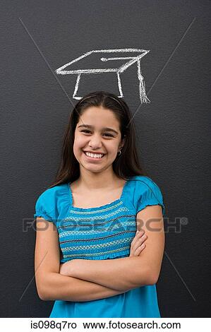 Portrait of a girl and a chalk mortar board View Large Photo Image Picture - Portrait of a girl and a chalk mortar board. Fotosearch