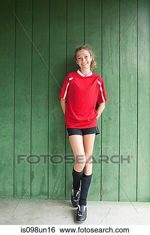 Stock Photograph - Portrait of a girl soccer player. Fotosearch
