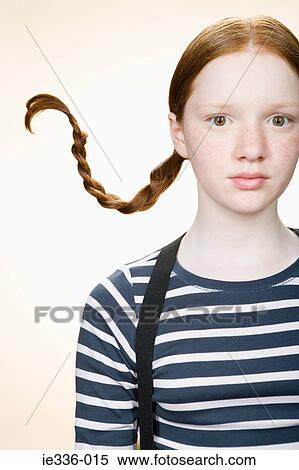 Portrait of a girl with pigtails View Large Photo Image Stock Photography - Portrait of a girl with pigtails. Fotosearch