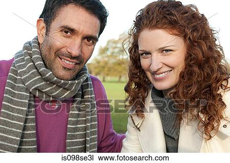 Portrait of a happy couple in dulwich park View Large Photo Image Stock Image - Portrait of a happy couple in dulwich park. Fotosearch