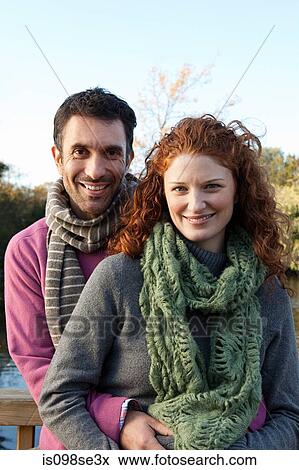 Portrait of a happy couple in dulwich park View Large Photo Image Stock Photo - Portrait of a happy couple in dulwich park. Fotosearch