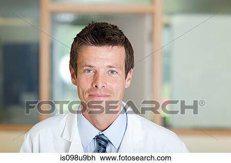 Portrait of a male doctor View Large Photo Image Stock Image - Portrait of a male doctor. Fotosearch
