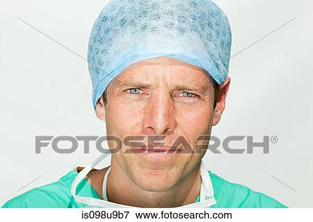 Stock Photo - Portrait of a male surgeon. Fotosearch
