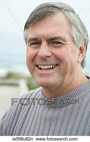 Picture - Portrait of a mature man outdoors. Fotosearch