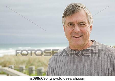 Portrait of a mature man outdoors View Large Photo Image Picture - Portrait of a mature man outdoors. Fotosearch