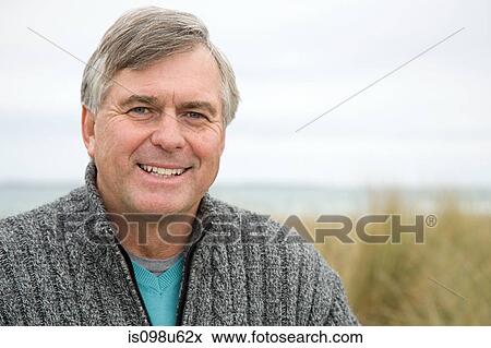 Portrait of a mature man outdoors View Large Photo Image Stock Photo - Portrait of a mature man outdoors. Fotosearch