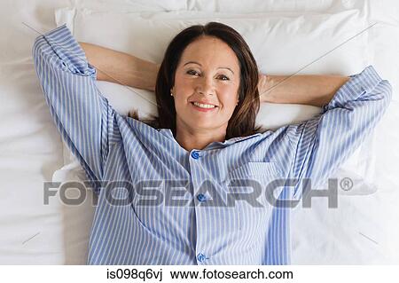 Portrait of a mature woman having breakfast View Large Photo Image Stock Image - Portrait of a mature woman having breakfast. Fotosearch