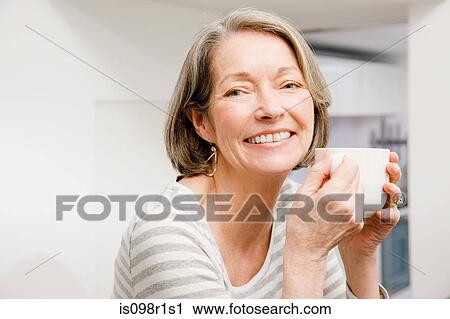 Portrait of a mature woman View Large Photo Image Stock Image - Portrait of a mature woman. Fotosearch