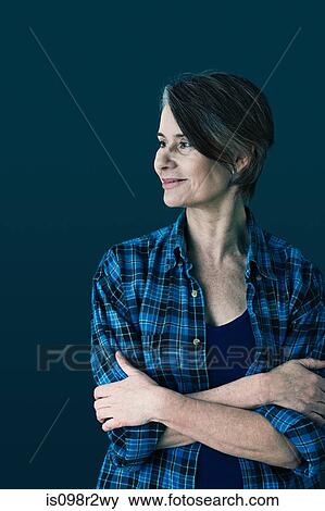 Portrait of a mature woman View Large Photo Image Stock Photo - Portrait of a mature woman. Fotosearch