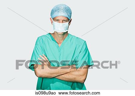 Portrait of a surgeon in mask View Large Photo Image Picture - Portrait of a surgeon in mask. Fotosearch