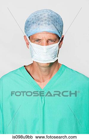 Portrait of a surgeon in mask View Large Photo Image Stock Image - Portrait of a surgeon in mask. Fotosearch