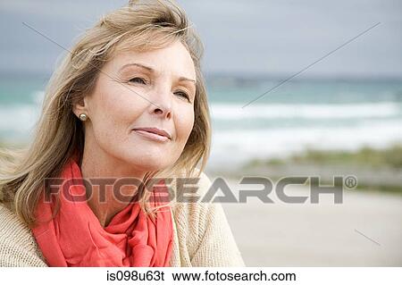 Portrait of a woman outdoors View Large Photo Image Stock Photograph - Portrait of a woman outdoors. Fotosearch
