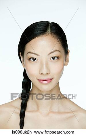 Stock Image - Portrait of a young chinese woman. Fotosearch