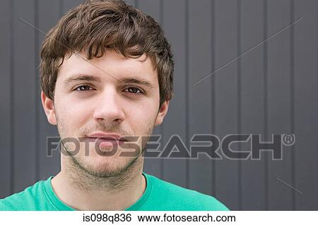 Portrait of a young man View Large Photo Image Stock Photograph - Portrait of a young man. Fotosearch