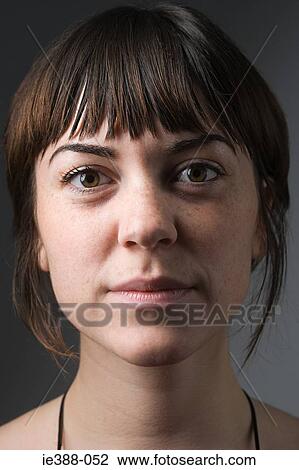 Stock Image - Portrait of a young woman. Fotosearch