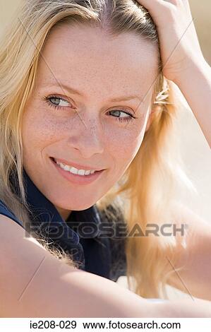 Portrait of a young woman View Large Photo Image Stock Photo - Portrait of a young woman. Fotosearch